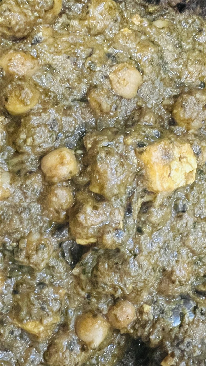 A hearty dish with greens and chickpeas